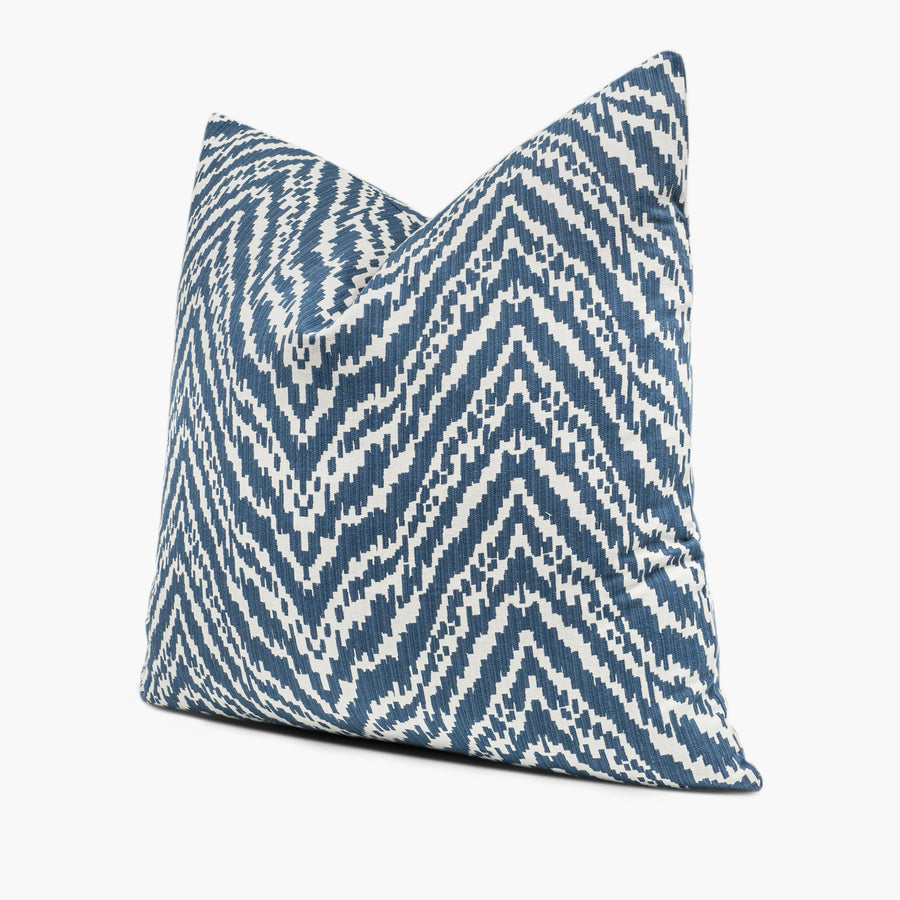 Side view of blue and white chevron throw pillow featuring Madcap Cottage Lady Mendl fabric