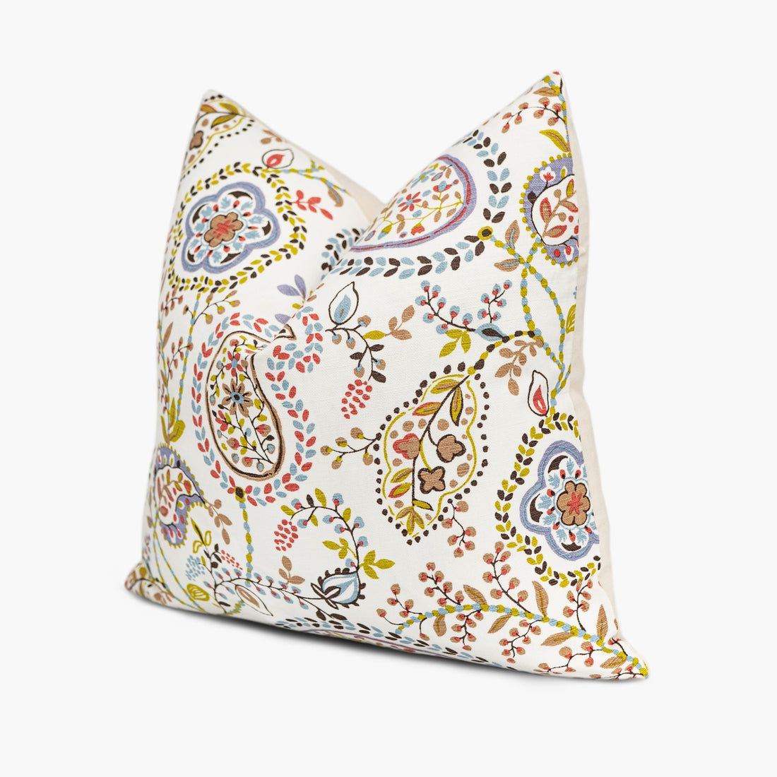 Side view of paisley throw pillow in colorful shades of blue, purple, red, and green