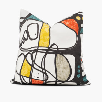 Abstract art throw pillow cushion in white, red, blue, and yellow