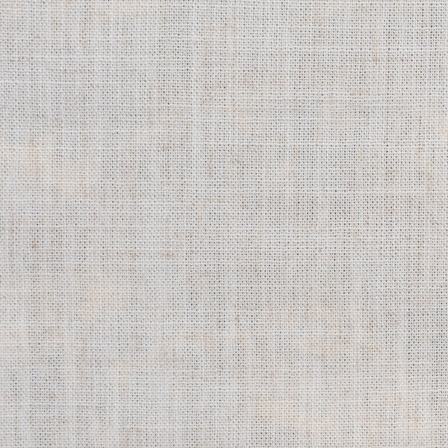 A close-up is shown of a woven fabric in a solid off-white color.